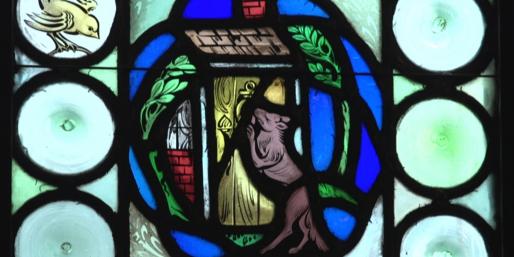 Stained glass portrayal of Red Riding Hood and the Big Bad Wolf.